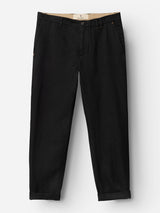 The BGpalco Ian Pant - Black by Blue de Gênes is a pair of black linen wool trousers with front pockets, button and zipper closure, and rolled-up cuffs, featuring a tapered silhouette and displayed on a white background.