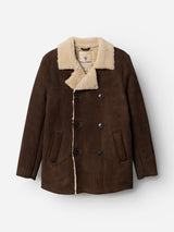 The BGseras Shearling Coat - Dark Brown by Blue de Gênes is a brown suede coat with a double-breasted closure, featuring a cream-colored faux shearling collar and lining, two side pockets, and black buttons, displayed against a white background.
