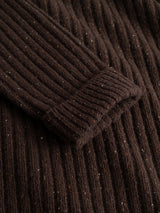 Close-up of the BGcallum Zip Knit sweater sleeve by Blue de Gênes in Hot Fudge Brown, highlighting the chunky rib-knit texture and speckled pattern.