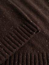 Close-up of the Blue de Gênes BGadamo Crewneck Knit in Hot Fudge Brown, featuring dark brown wool knit fabric with ribbed edges and small multicoloured nep flecks of blue, white, and orange throughout the material.