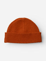 The BGboshi Beanie in Ginger Bread Orange by Blue de Gênes, featuring a knitted wool construction and a ribbed turn-up brim, is displayed on a plain white background.