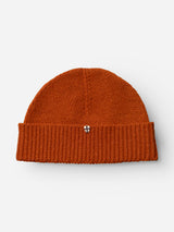 The BGboshi Beanie - Ginger Bread Orange by Blue de Gênes is a rust-orange wool hat with a ribbed turn-up and folded cuff, finished with a small shield-shaped patch on the front. It is shown against a white background.