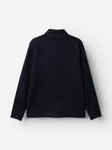 The BGhew Wool Overshirt by Blue de Gênes in dark navy, crafted from warm boiled wool, is shown hanging against a plain white background with the back side visible, featuring a collar, buttoned cuffs, and a simple straight hem.