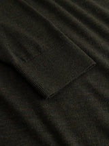 Close-up of the BGhamish Crewneck Knit by Blue de Gênes in Beech Green, showing the sleeve cuff laying flat on matching fabric and highlighting the texture and ribbed pattern of the lightweight merino wool knit.