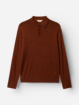The Blue de Gênes BGigor Polo Knit in Ginger Bread Orange is a long-sleeve fine-gauge knit polo shirt with a collar and three-button placket, shown on a white background. It features ribbed cuffs and hem, as well as a small stitched emblem near the bottom hem.