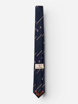 The BGshield Tie - Dark Navy by Blue de Gênes showcases thin diagonal tan stripes and small shield-like emblems, and is neatly folded against a plain white background.