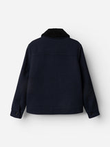 The BGdugal Bomber Jacket in Dark Navy by Blue de Gênes is shown from the back, featuring a black teddy collar, long sleeves with buttoned cuffs, and a straight hem.