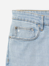 Close-up of the upper part of BGvinci Trueblue Jeans - Mid Blue Denim by Blue de Gênes, featuring waistband, belt loop, front pocket, coin pocket with metal rivets, and yellow stitching against a white background.