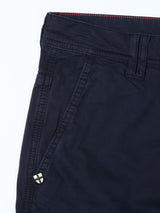 Close-up of the upper section of the BGpaulo Teo Pant in Dark Navy by Blue de Gênes, highlighting a side pocket, part of the waistband, a belt loop, and a small metallic detail near the pocket.