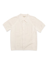Introducing the BGbilly S/S Cardigan - Chalk by Blue de Gênes, a vintage-inspired short-sleeve knit cardigan featuring a classic collar, front button closure, and a subtle textured pattern throughout the 100% cotton fabric for exceptional comfort and timeless style.