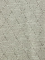 Close-up of the BGwally Diamond Polo in Shadow Green by Blue de Gênes, featuring a cotton linen blend fabric with an intersecting diamond quilted pattern that adds a textured and padded appearance.