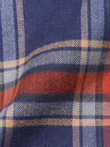 Close-up of the Yodo Check Overshirt - Multi Check by Blue de Gênes, featuring soft woven fabric with navy blue, orange, beige, and green plaid—perfect for a relaxed fit. Gentle fabric waves reveal its rich texture and depth.