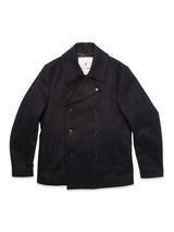 The Blue de Gênes Shiba Melton Coat in Dark Navy, expertly crafted in Portugal from premium Italian Melton wool, features a classic double-breasted front with wide lapels, six buttons, and side pockets. The coat is laid flat on a white background.