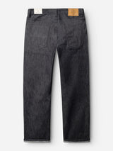 The BGleroy Jeans - Raw Denim by Blue de Gênes are shown from the back in a dark gray hue, featuring two rear pockets and dual waistband labels—one white, one brown. These five-pocket jeans showcase innovative denim construction with no outer leg seam for a sleek and modern appearance.