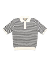 The Blue de Gênes BGbob Knit Polo - Navy is a short-sleeved cotton polo with cream collar, cuffs, and hem, featuring thin navy and cream stripes for a classic look.