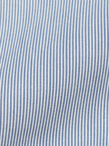 Close-up of Blue de Gênes Gabbiano Riga Blazer in blue stripe cotton yarn dye fabric, with gentle folds and light-shadow depth—perfect for a relaxed fit summer blazer.