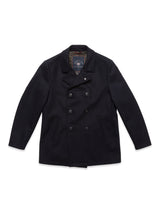 The Blue de Gênes Peacoat - Dark Navy is a double-breasted coat with six buttons, two side pockets, and a notched collar, displayed flat on a white background.