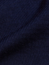 Close-up of the Tributo Cycling Jersey - Navy by Blue de Gênes, highlighting its textured, ribbed navy blue knitted fabric and soft finish.