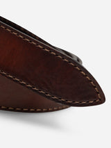 Close-up of the tip of the BGualan Belt - Brown by Blue de Gênes, showcasing detailed stitching along the edge and a smooth, polished full-grain leather finish—handmade in Italy for unmatched craftsmanship.