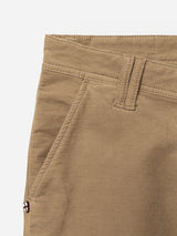 Close-up of BGpaulo Ottawa V3 Trousers in Sepia Tint Brown by Blue de Gênes, highlighting the waistband, belt loop, front pocket, and a small embroidered emblem near the pocket. These regular slim fit trousers combine style and comfort in every detail.