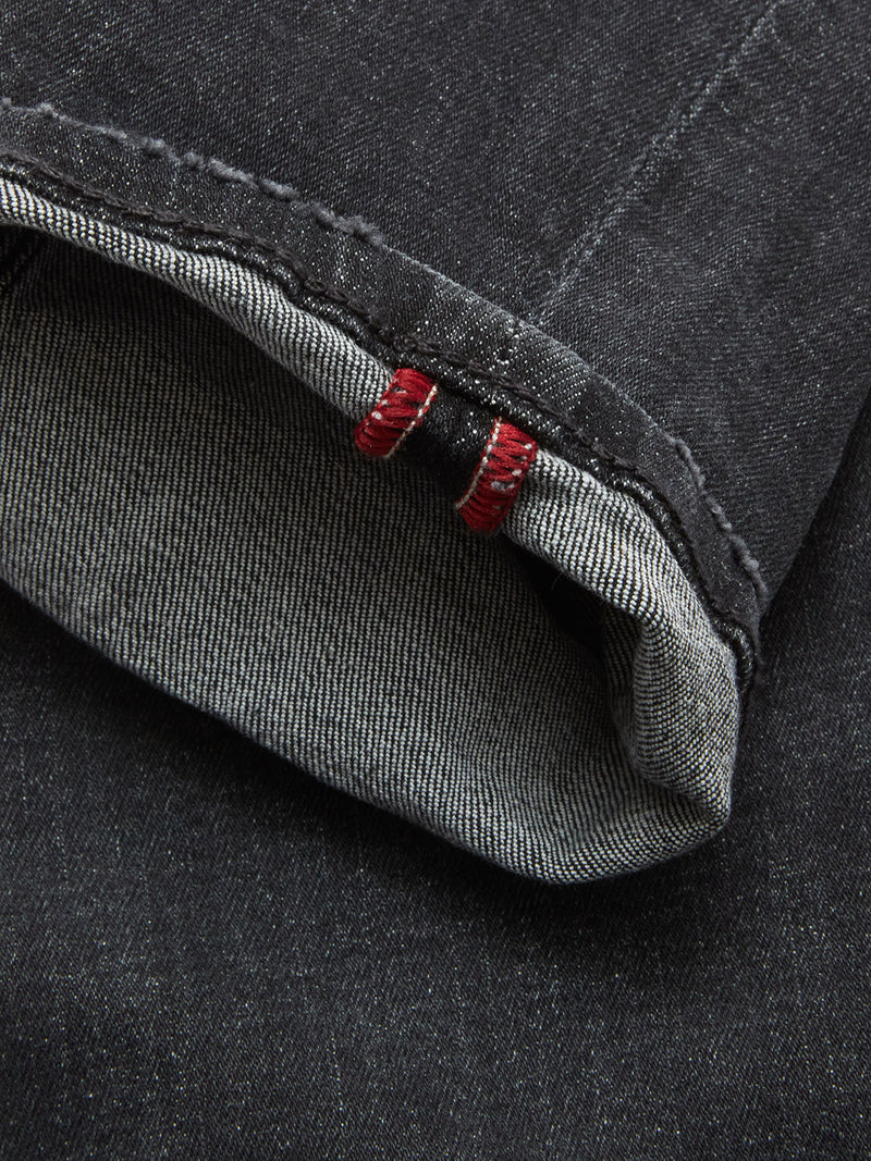 Close-up of the cuff on Vinci G Dark Grey Jeans by Blue de Gênes, featuring a neatly folded hem with visible white selvage edge and two red stitch accents in premium comfort stretch grey denim.