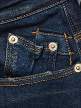 Close-up of Repi Dark Vintage Jeans by Blue de Gênes in mid-blue denim, featuring comfort stretch fabric, visible stitching, rivets, and a small coin pocket inside the front pocket.