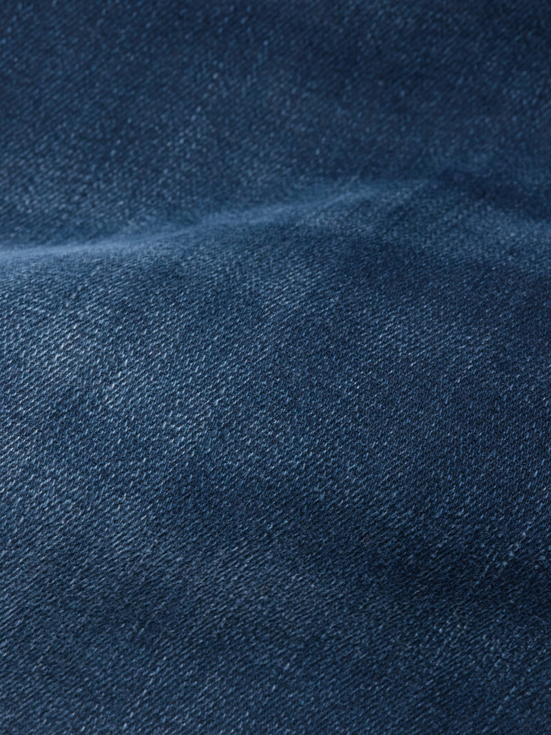 Close-up of Blue de Gênes Repi BlueBlk Used Jeans in blue-black denim, highlighting the textured weave and color variations—ideal for crafting durable, comfortable slim-fit jeans.