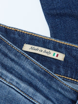 A close-up of Recco Blue Vintage Jeans - Vintage Wash by Blue de Gênes, featuring tapered legs and a label reading Made in Italy with the Italian flag.