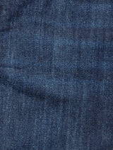 Close-up of Giacomo Dark Horse Jeans - Denim Blue by Blue de Gênes, highlighting the blue rigid denims woven texture and subtle color variations typical of relaxed loose fit jeans.