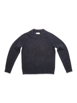 The Blue de Gênes Honshu Crewneck Knit in navy is a long-sleeve, lambswool blend sweater with multicolored speckles, shown laid flat on a white background.