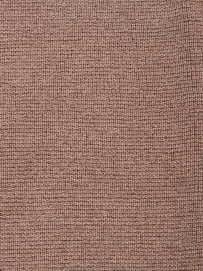 Close-up of the textured brown Porto Knit - Fungi by Blue de Gênes. This 100% wool crewneck sweater features a woven, grid-like pattern with slightly raised threads, adding a rugged and tactile finish to this menswear staple.