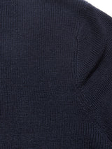 Close-up of the Porto Knit - Navy by Blue de Gênes, highlighting its detailed ribbed knit texture and fine stitching—ideal for classic menswear style.