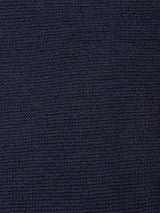 Close-up of the Porto Knit - Navy by Blue de Gênes: textured dark blue wool fabric with a subtle grid-like weave, giving this crewneck sweater a refined, tactile look—ideal for elegant menswear.