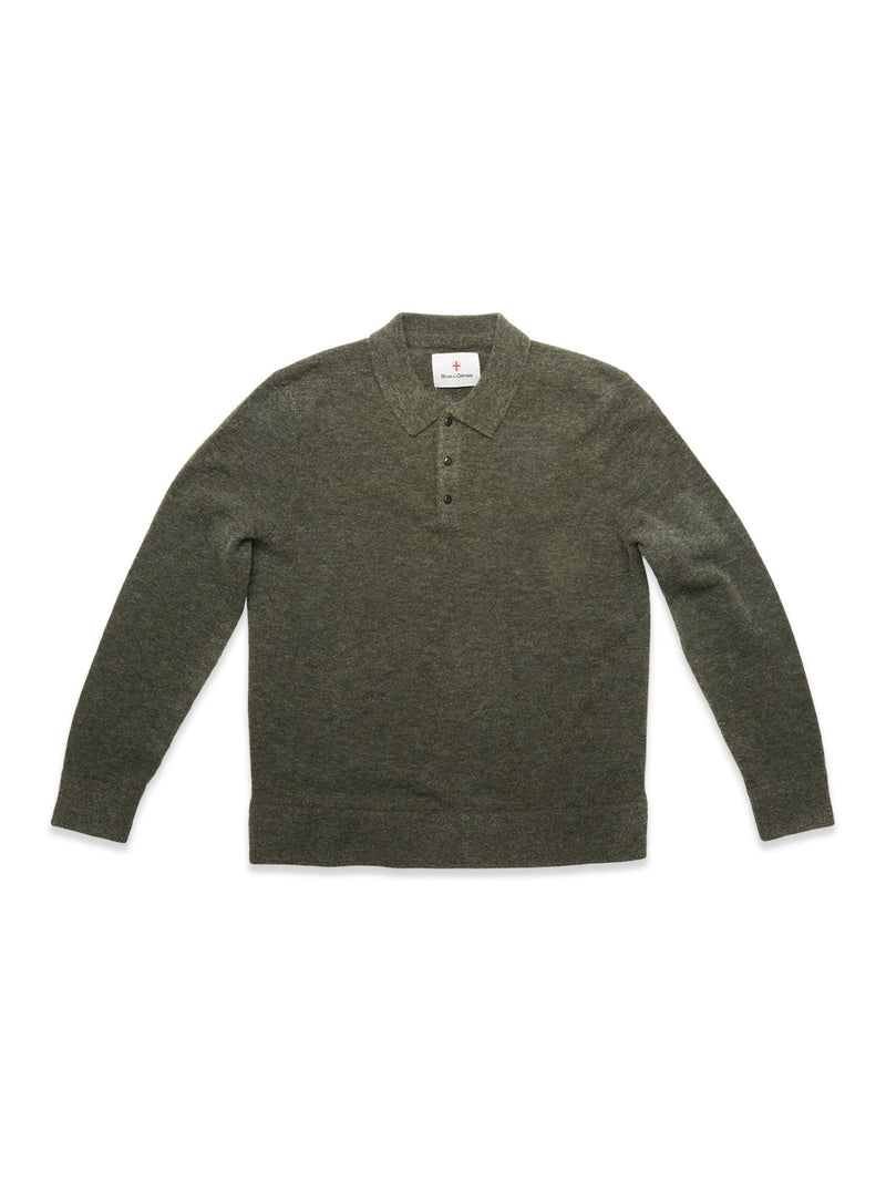 The Blue de Gênes Malakka Polo Knit - Army is a long-sleeve, wool-blend sweater in olive green with a collar and three corozo buttons, shown laid flat on a white background.