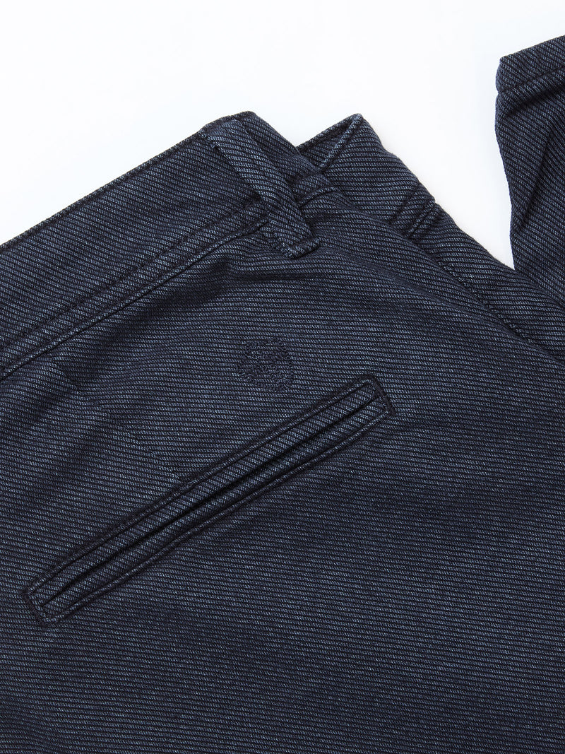 Close-up of the waistband and back pocket of Blue de Gênes Menzo Olanda Chino - Navy, showcasing detailed stitching and the textured cotton stretch fabric.