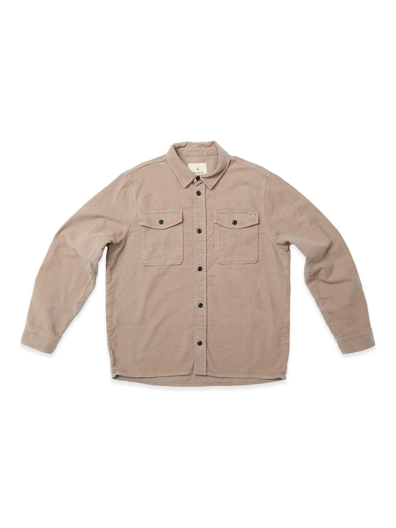The Blue de Gênes Nagano Overshirt - Fungi is a beige cotton moleskin long-sleeve button-up with black buttons, two chest pockets, visible stitching, and a garment-dyed finish, shown laid flat on a white background.