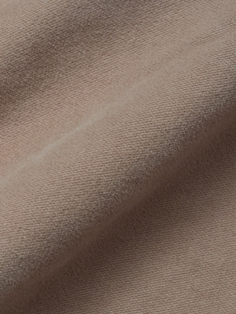 Close-up of light brown, soft, fuzzy cotton moleskin with a ribbed texture—ideal for the Blue de Gênes Nagano Overshirt - Fungi. Fine fibers and smooth surface ensure comfort and style.