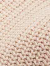 Close-up of the Yomaha Halfzip Knit - Fungi by Blue de Gênes, featuring a soft, cream-toned chunky knit with thick wool blend yarn and textured interlocking loops that showcase quality craftsmanship.