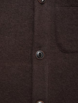 Close-up of a brown wool shirt with black buttons and chest pocket detail—pairs perfectly with the Blue de Gênes Koi Wool Gilet in Chocolate for added style.