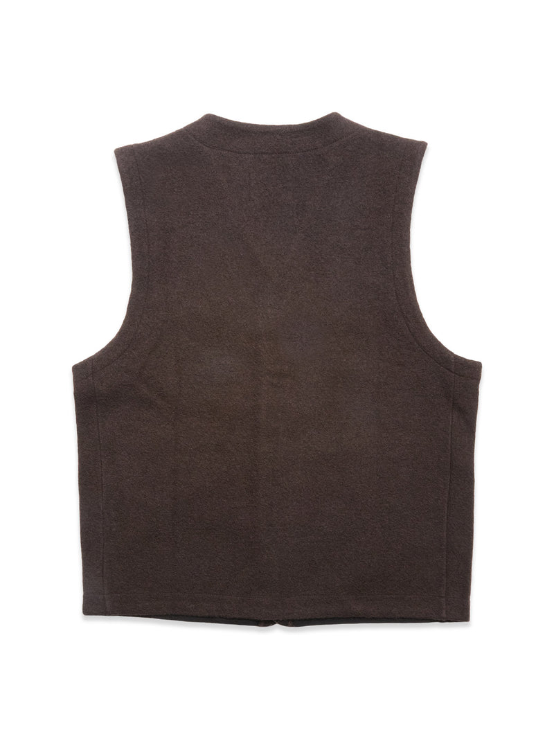 The Blue de Gênes Koi Wool Gilet - Chocolate is a sleeveless, dark brown boiled wool vest shown laid flat, back facing up on a white background, featuring a simple design with no visible patterns or closures.