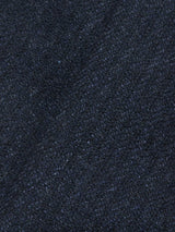 Close-up of the Blue de Gênes Kibishi Solid Pant in Dark Navy, featuring Italian wool-blend fabric with a textured, slightly fuzzy surface and a subtle diagonal crease—perfect for tailored pants.