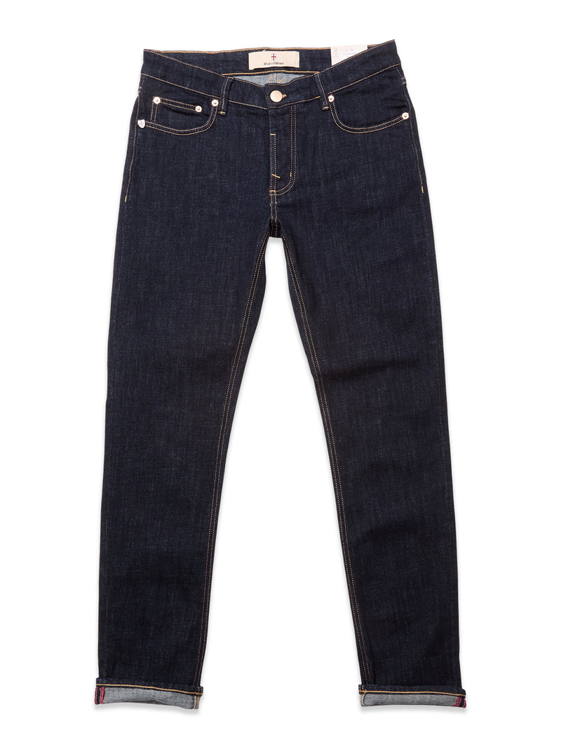 The Vinci Girisha Rinse Jeans by Blue de Gênes are regular fit, dark blue comfort stretch denim jeans with rolled-up cuffs, five pockets, visible stitching, and a button fly, shown laid flat on a white background.