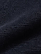 Close-up of soft, navy comfort stretch twill with visible diagonal weave and gentle folds—crafted for the Vinci Iro Pant by Blue de Gênes.
