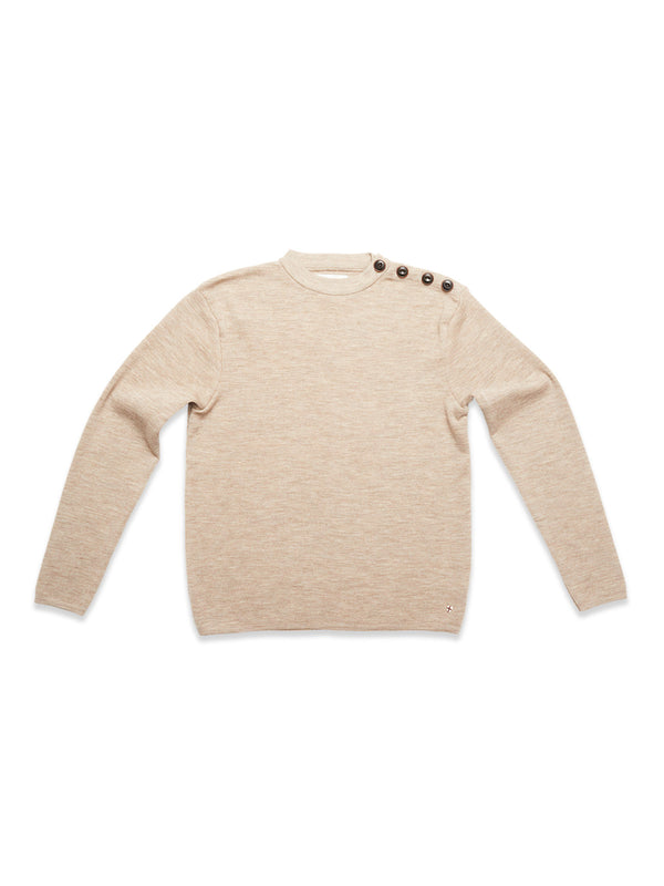 The Blue de Gênes Toyama Knit L/S in oat is a beige Merino wool crewneck sweater with long sleeves and three dark buttons on the left shoulder, shown laid flat on a white background.