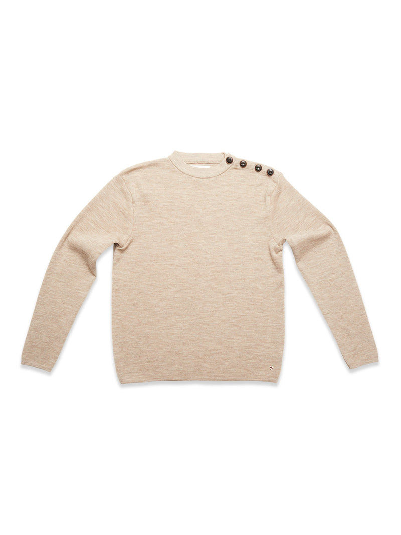The Blue de Gênes Toyama Knit L/S in oat is a beige Merino wool crewneck sweater with long sleeves and three dark buttons on the left shoulder, shown laid flat on a white background.