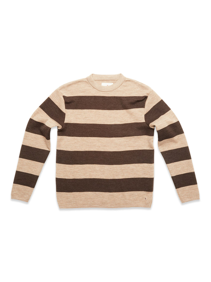 The Blue de Gênes Toyama Stripe Knit L/S - Oat is a cozy crewneck sweater with wide beige and dark brown stripes, shown laid flat on a white background.