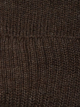 Close-up of the Boshi Beanie - Brown by Blue de Gênes, highlighting its textured rib knit and thick, soft yarn for a cozy look. Expertly crafted in Denmark, this Merino wool beanie is both warm and stylish.