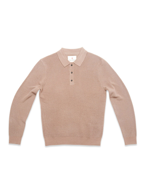 The Porto Polo Knit - Fungi by Blue de Gênes is a light brown, long-sleeve wool polo with a collar and four dark buttons, shown laid flat on a white background.
