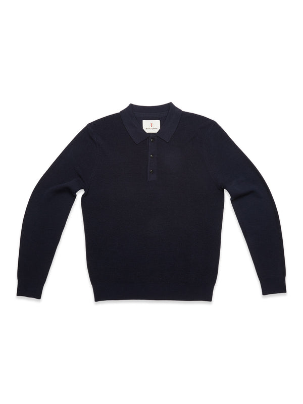 The Blue de Gênes Porto Polo Knit in navy is a long-sleeved sweater featuring a collar and four-button placket, shown laid flat on a white background for a stylish, casual look.