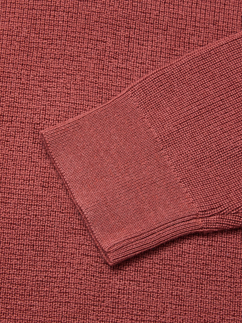 A close-up of the Porto Polo Knit - Henna by Blue de Gênes highlights its refined texture and elegance, embodying the timeless appeal of classic leisurewear.